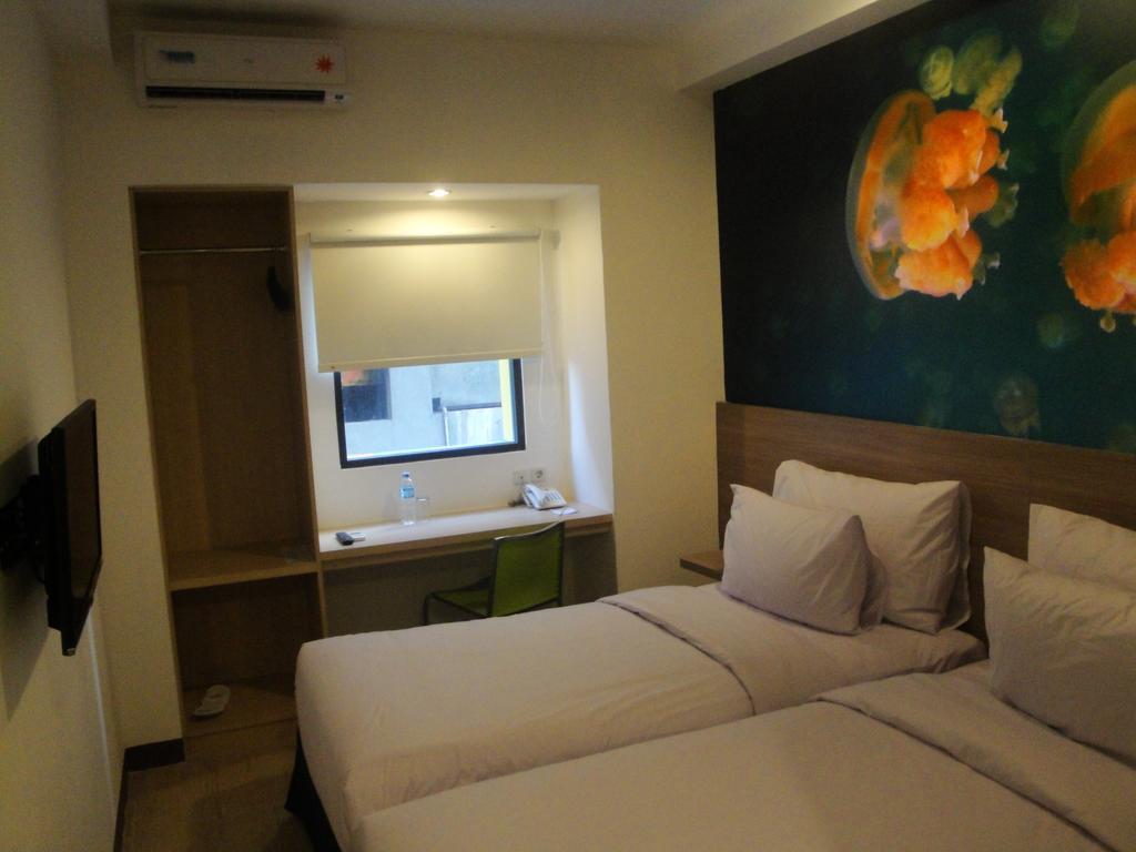 Top Hotel Manado By Gran Puri Room photo