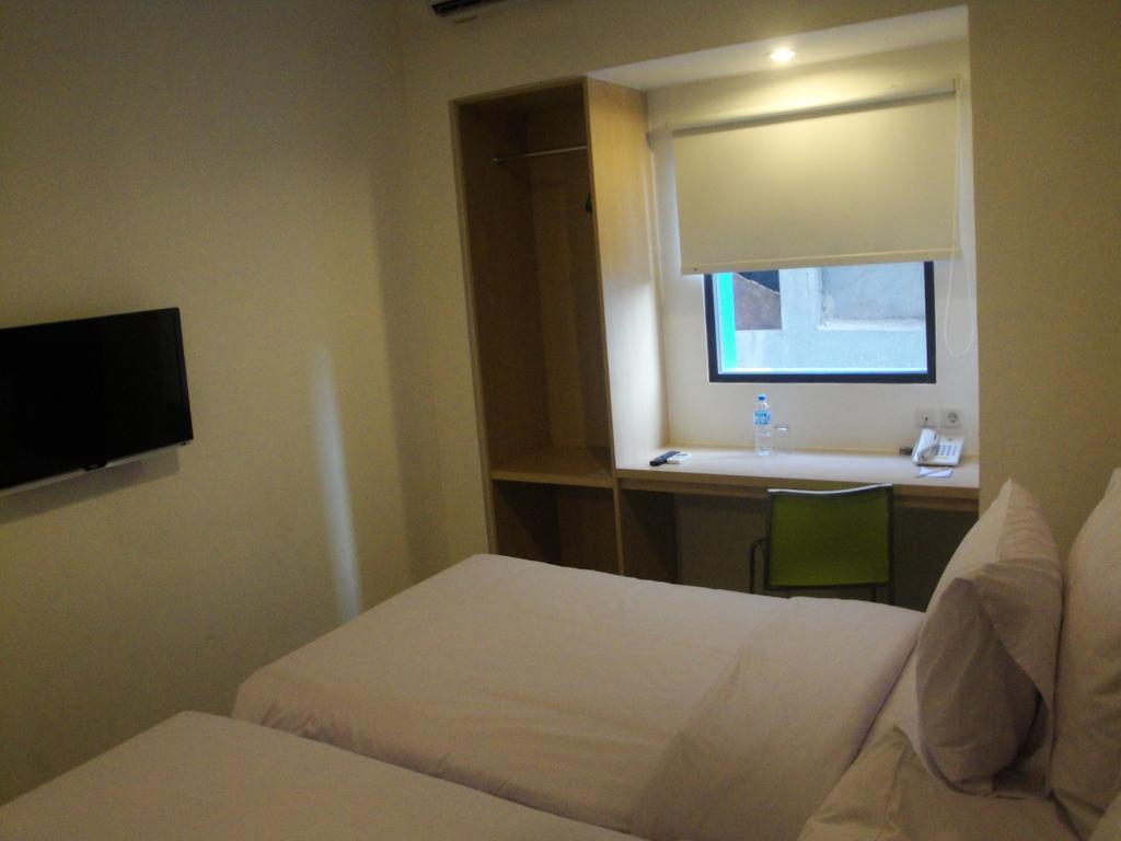 Top Hotel Manado By Gran Puri Room photo